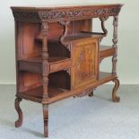 An early 20th century Chinese carved hardwood side cabinet,