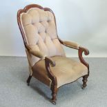 A Victorian beige upholstered show frame armchair,