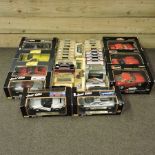 A collection of Burago and Maistro diecast model cars,