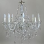 A Victorian style brass eight branch chandelier,