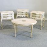A set of three cream painted bedside tables, 46cm each, with floral decoration,