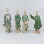 A collection of four Chinese green glazed terracotta figures,