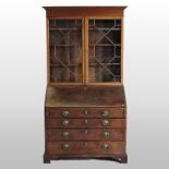 A George III mahogany bureau bookcase,