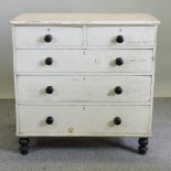 A Victorian white painted pine chest of drawers,
