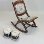 A 19th century upholstered rocking chair,