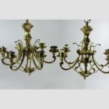 A pair of brass six branch chandeliers,