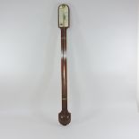 An early 20th century stick barometer, signed I.