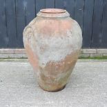 A large terracotta garden pot,