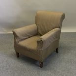 A Victorian brown upholstered armchair,