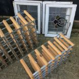 A set of four leaded glass windows, 57 x 44cm each,