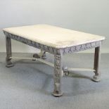 A white painted carved wood dining table, signed to the leg 'Edgar',