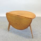 An Ercol light elm drop flap occasional table,