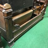A 19th century French walnut double bedstead,