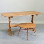 An Ercol style medium elm dining table, 152 x 76cm,