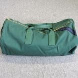 A Prada green ladies holdall,