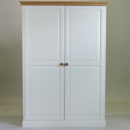 A modern pine and painted wardrobe,