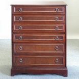 A Stag style chest of drawers,