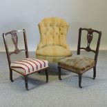 A Victorian gold upholstered button back armchair,