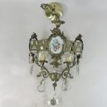 A gilt metal and porcelain mounted chandelier,
