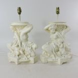 A pair of white painted plaster figural table lamps,