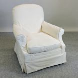 An upholstered armchair,