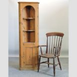 A 19th century elm seated stick back chair, together with a pine narrow corner cupboard,