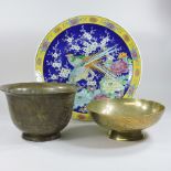 A Chinese pottery charger, 41cm diameter, together with an Eastern brass bowl,