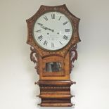 A 19th century walnut drop dial wall clock, the painted dial showing Roman numerals, signed 'Storer,