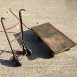 A metal sack barrow, together with a Slingsby platform truck,