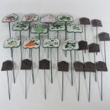 A collection of twenty four metal herb garden markers