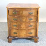 A walnut bachelor's serpentine chest,