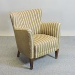 An early 20th century Danish striped upholstered tub chair