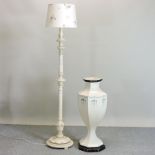 A white painted standard lamp,