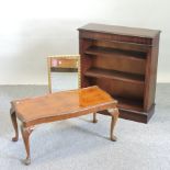 A reproduction dwarf open bookcase,