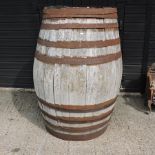 A large oak coopered barrel,