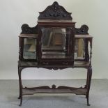 A Victorian mahogany display cabinet, on cabriole legs,