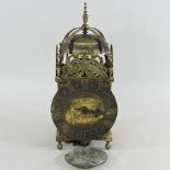 A reproduction brass lantern clock,