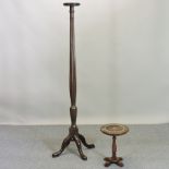 An early 20th century mahogany torchere, together with an Indian hardwood occasional table,