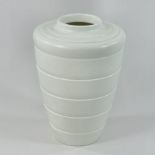 A Wedgwood white moonstone glazed shoulder vase, designed by Keith Murray, shape 3805,