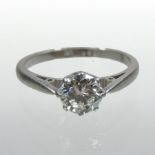 An unmarked solitaire diamond ring,