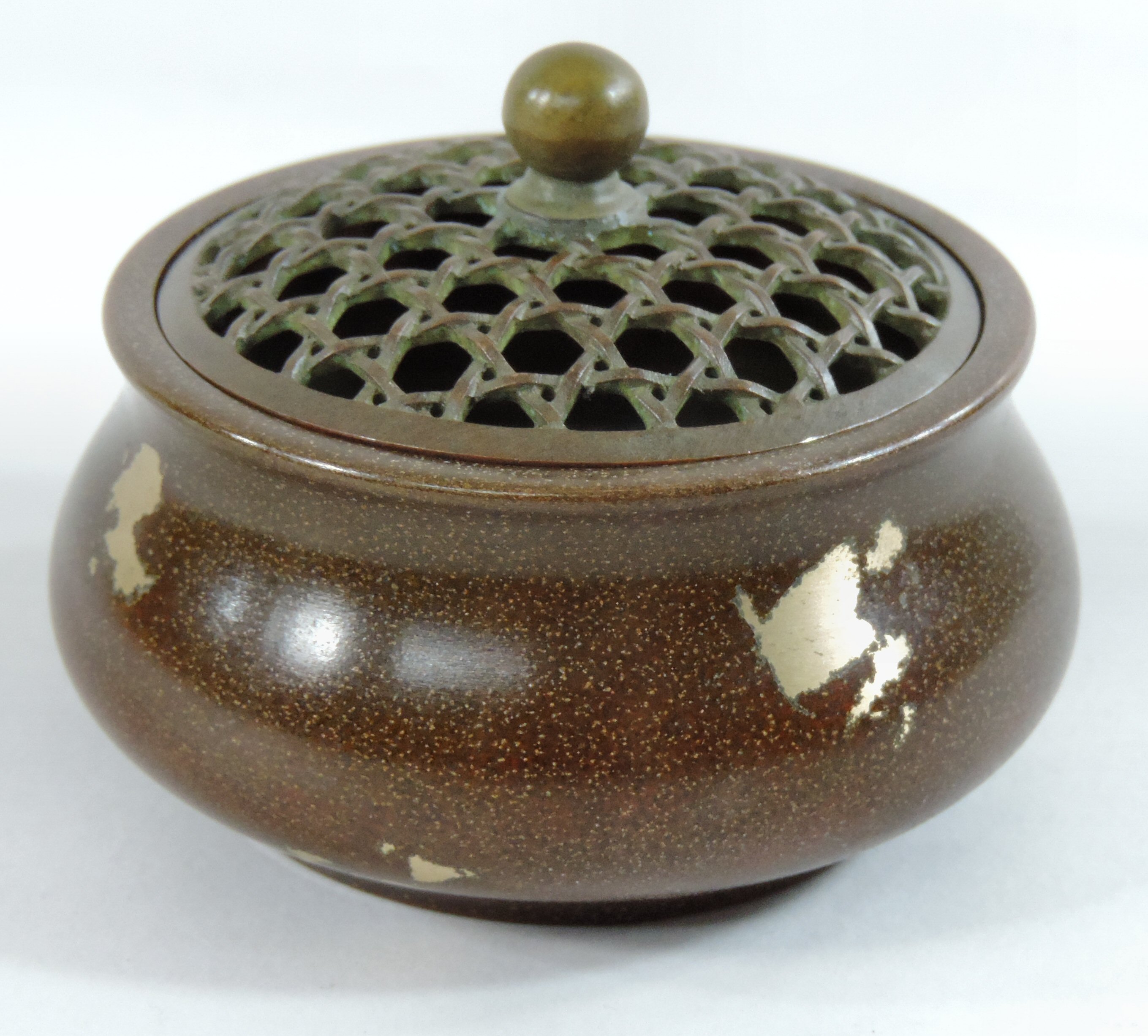 A Chinese bronze censer, with gold splash decoration,