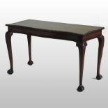 An George II style mahogany serpentine serving table, on cabriole legs,