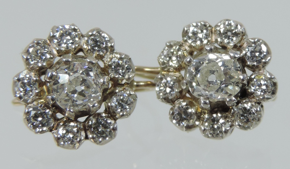 A pair of diamond cluster earrings, each central stone approximately . - Image 3 of 5