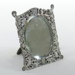 A Victorian pierced silver framed easel mirror,