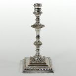 An 18th century Sheffield plated candlestick, with removable sconce above a knopped stem,