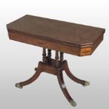 A Regency mahogany and ebony strung folding card table, with canted corners,