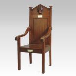 A 20th century oak throne chair,