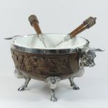 An early 20th century oak and silver plated salad bowl,