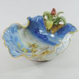 A Cantagalli maiolica dish, in the form of a shell,
