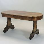 A late Regency rosewood library table, the frieze containing a pair of short drawers,